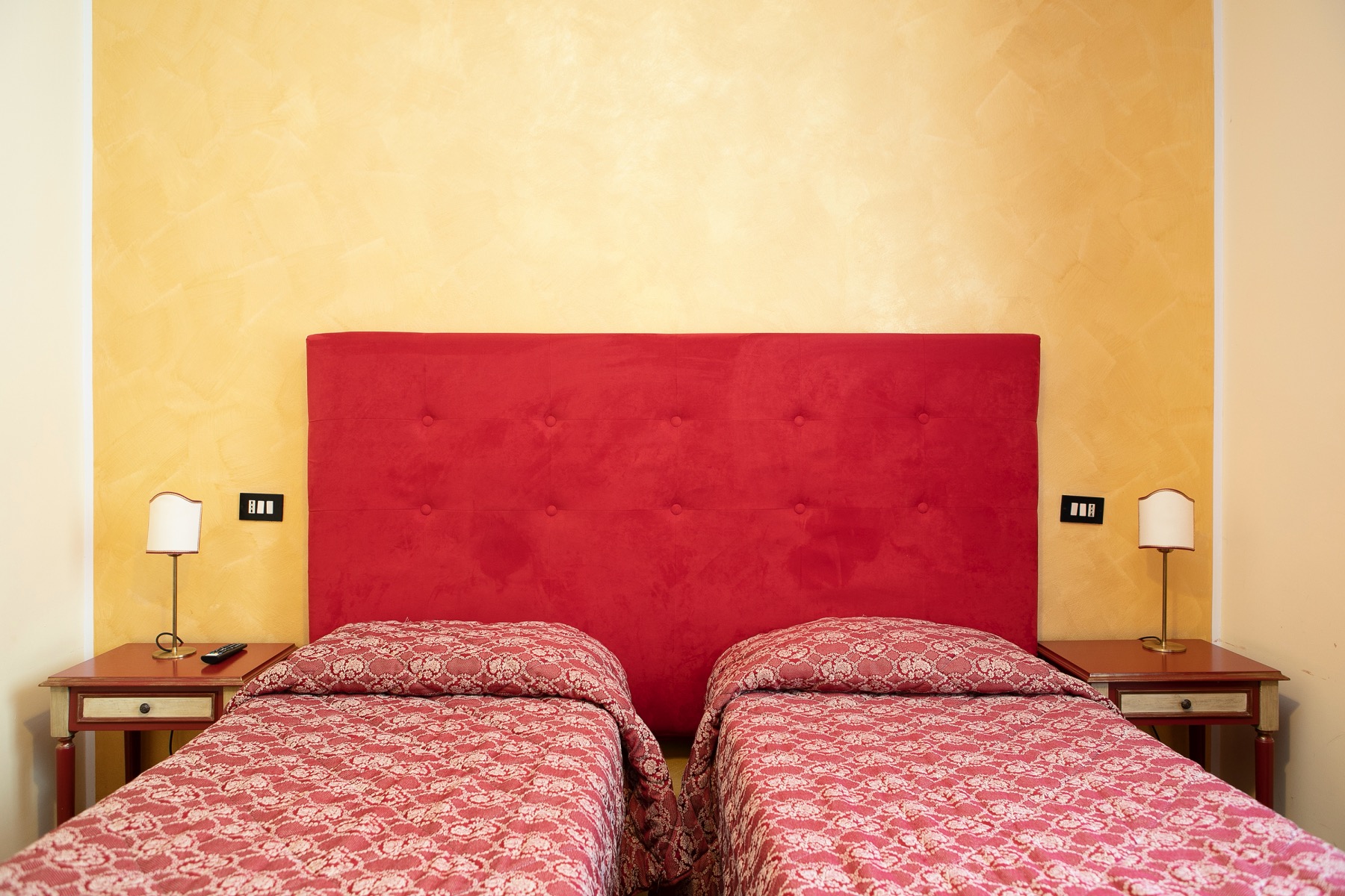 Una delle camere dell’Hotel Fiordigigli